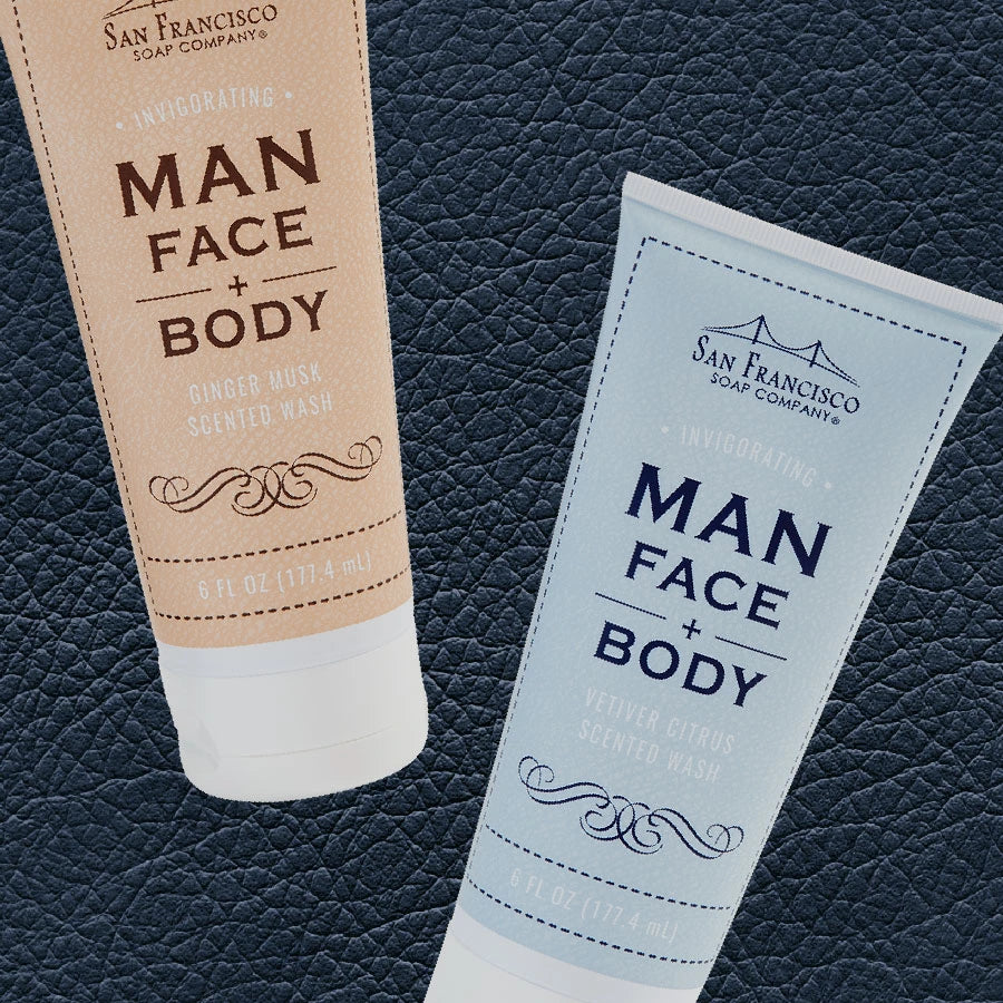 Man Bar Face & Body Wash tubes on leather background