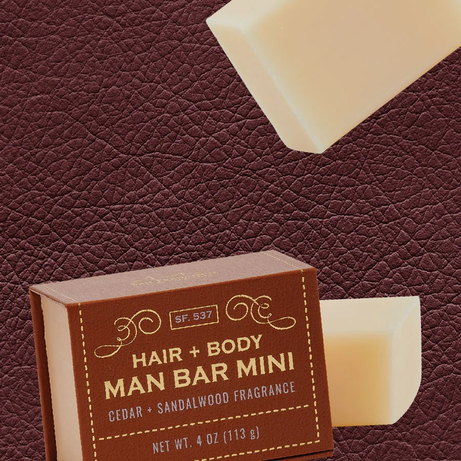 Man Bar Mini soaps and box on leather background
