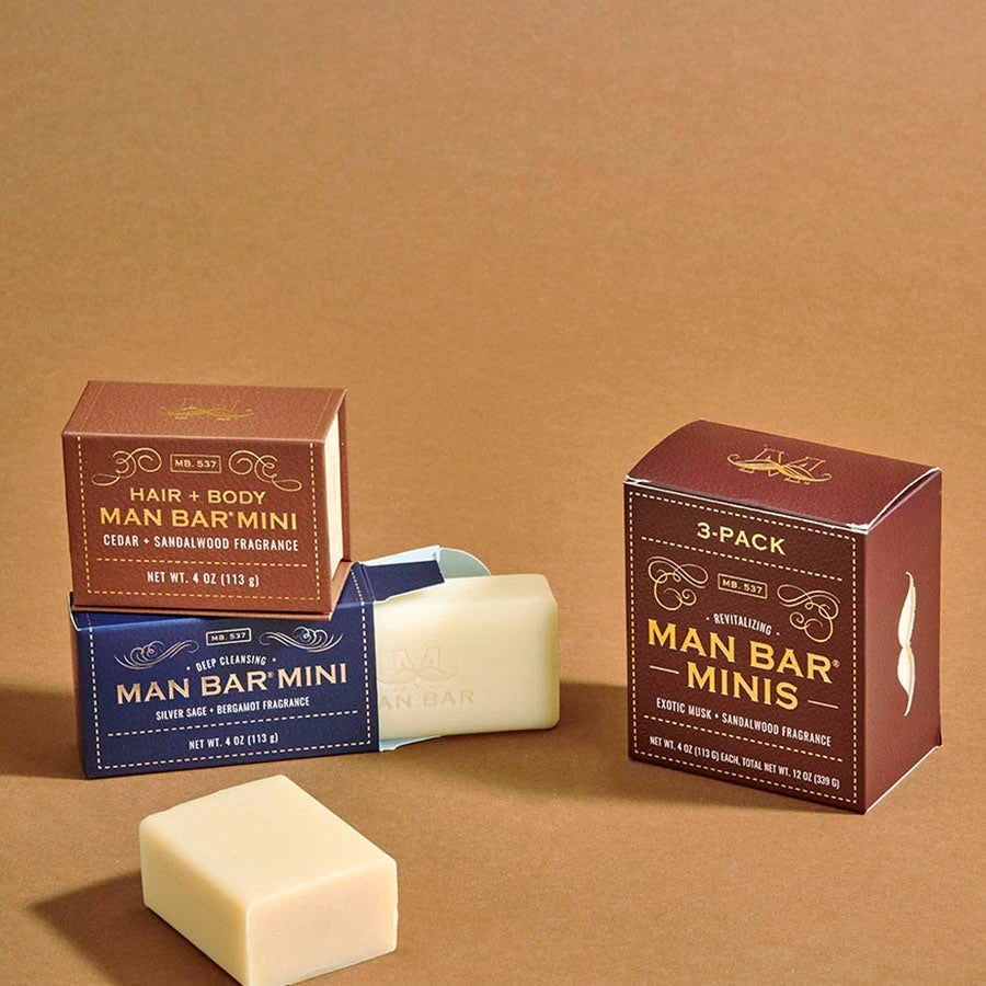 Man Bar Mini soaps and box on leather background